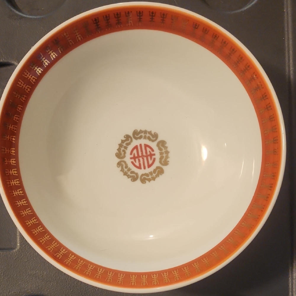 Orange and White Dinnerware Plate with Elegant Design